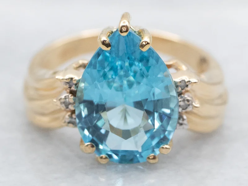 women’s promise engagement rings -Pear Cut Blue Topaz and Diamond Ring